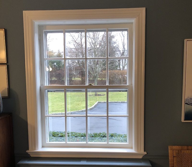 Single pane double hungs with a storm window